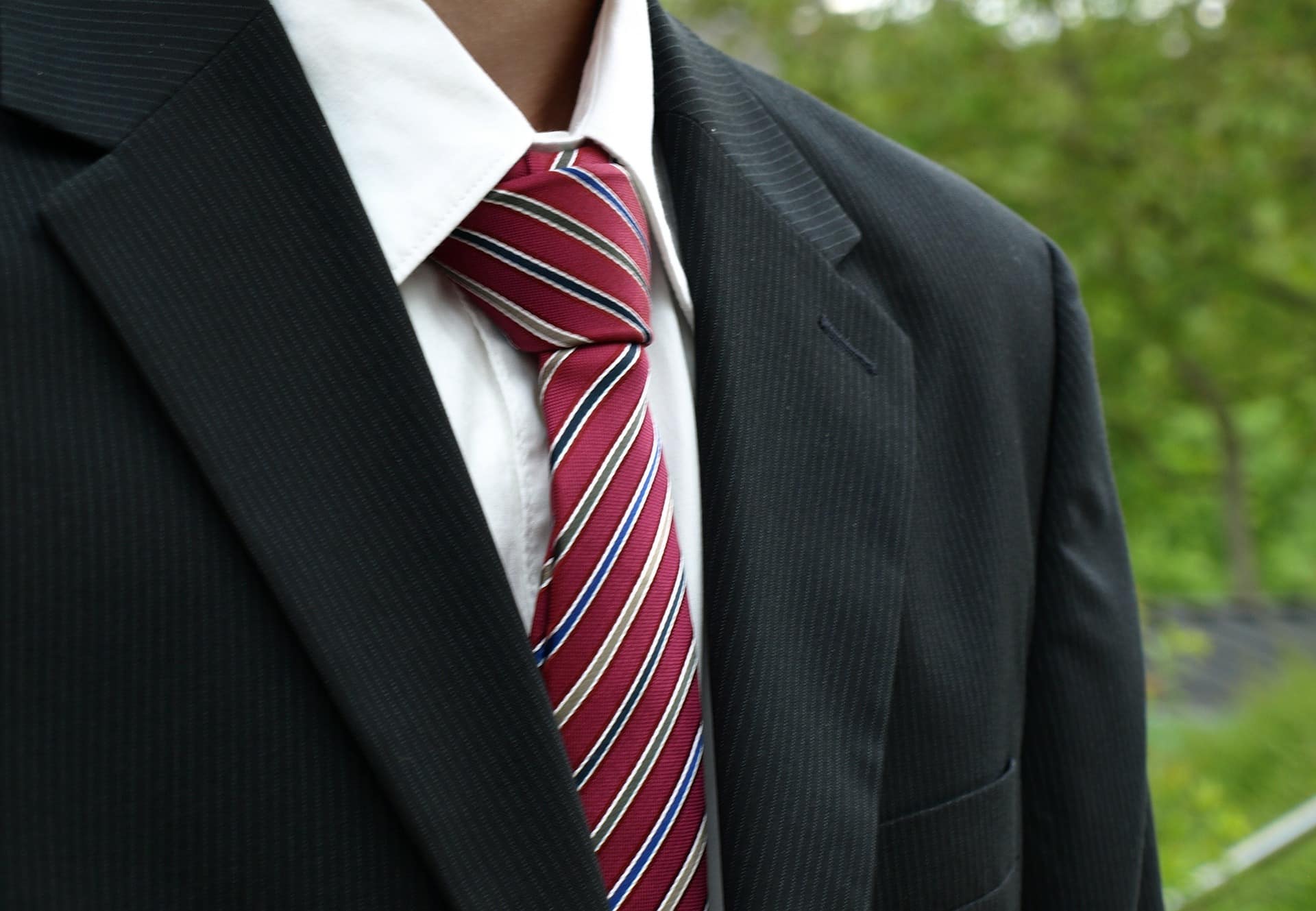 Les origines du costume cravate