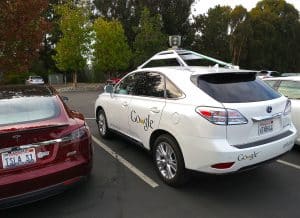 1280px-Driving_Google_Self-Driving_Car